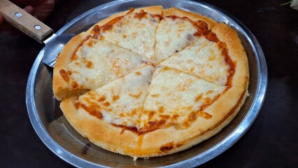 Delicious Cheese pizza on plate