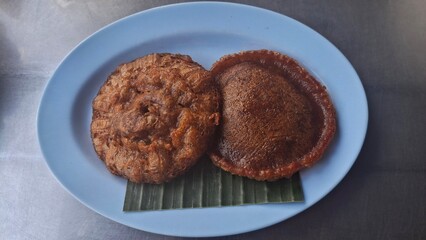 Kue cucur is indonesian traditional snack made from palm sugar. 
