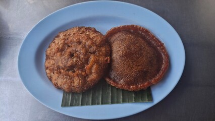 Kue cucur is indonesian traditional snack made from palm sugar. 