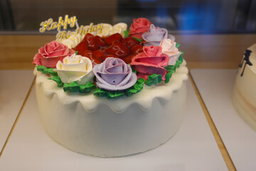 birthday cream cake with roses