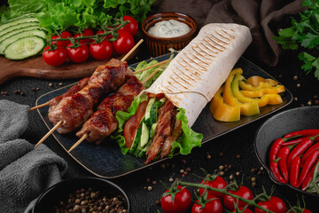 Juicy grilled meat skewers served with a fresh vegetable shawarma wrap, yellow pepper slices, and dipping sauce. Ideal for menu designs, delivery apps, and food advertising
