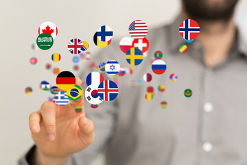 Abstract image of a hand interacting with floating flags, representing global connections and...