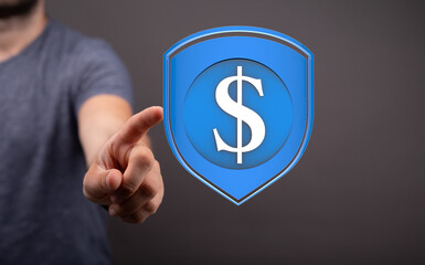 Hand pointing at a digital shield with a dollar sign, symbolizing financial security and protection.