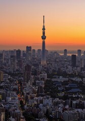 Photo of Tokyo Cityscape with Sunset Sky Building and Orange Horizon