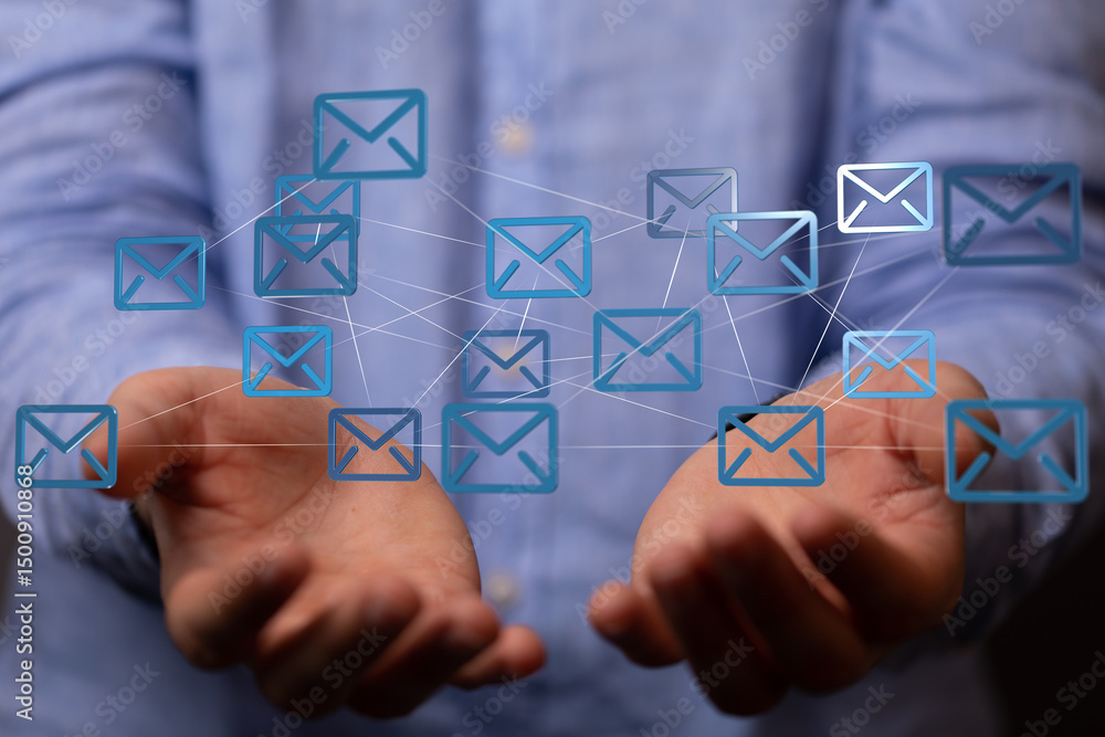 Poster image of a man's hands holding a network of email icons, representing global communication and conne