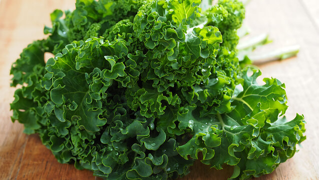 Fresh Curly Kale Greens on Wooden Table