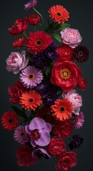 Vertical Photo Of A Floral Bouquet In Shades Of Red Pink And Purple Against A Dark Background