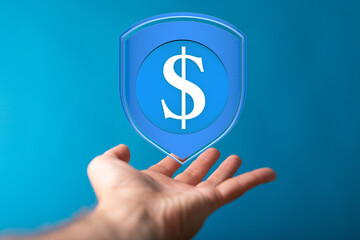 Hand reaching for a digital shield with a dollar sign, symbolizing financial security and...