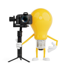 Content Creation And Filmmaking Concept. Yellow Cartoon Light Bulb Character Holding Camera On Tripod Stabilizer. 3d Rendering