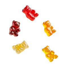 Colorful gummy bears flying isolated on white background. Mixed colored gummies for kids. Gummies falling.