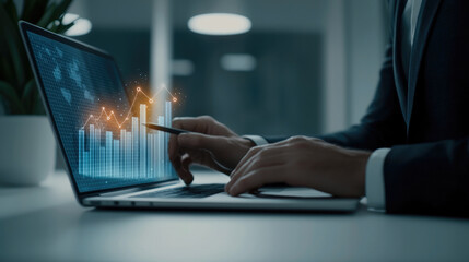 Businessman suit office laptop digital graph financial analysis growth success night