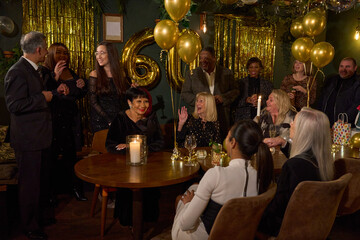 People at 60th birthday party at nightclub