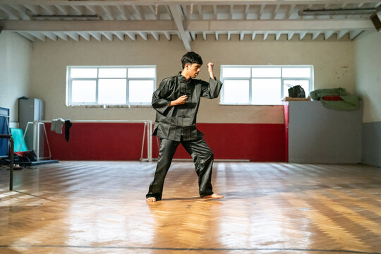 Man performing during Kung Fu Black Belt test