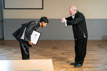 Man receiving kung fu black belt certificate