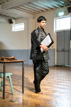 Man with kung fu black belt certificate