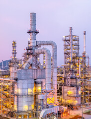 Aerial view oil and gas refinery plant at night, Global business energy logistic transportation, Oil and gas refinery petrochemical industrial, Petrochemical refinery industrial energy supply chain.