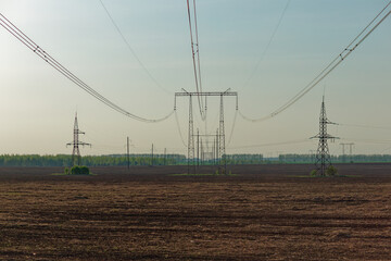 A field with a lot of power lines