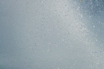 Close-up of dynamic water splash with droplets