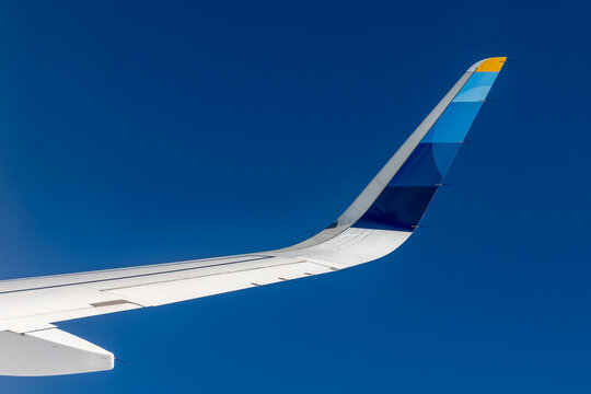 logo of Eurowings aircraft under blue sky bny departing Lanzarote airport as symbol for airline