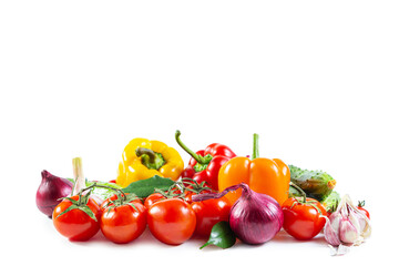 Mix of colorful vegetables - bell peppers,  tomatoes, cucumbers, onions and garlic.