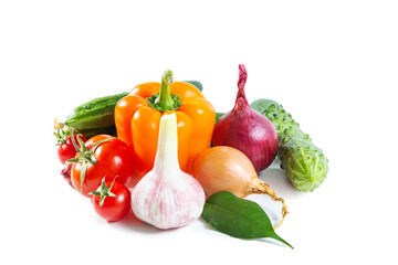 Mix of colorful vegetables - bell pepper, tomatoes, cucumbers, onions and garlic.