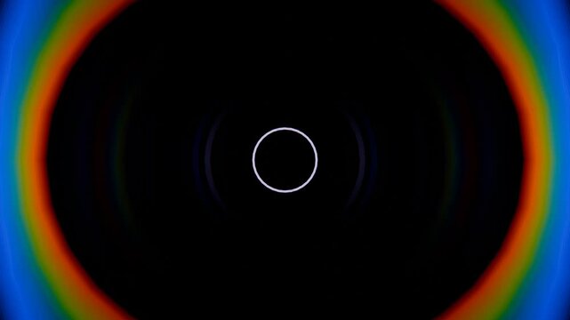 a black hole with a white circle in the center