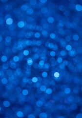 Abstract Blue Bokeh Background with Sparkling Light Effect