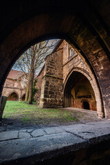Medieval Stone Cloister Viewed Through Archway
