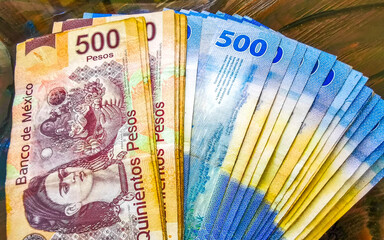 Mexican peso 500 bills on the table in Mexico.