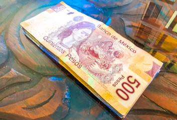Mexican peso 500 bills on the table in Mexico.