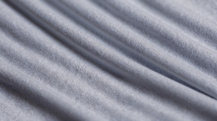 Textured gray fabric closeup soft drape and subtle weave