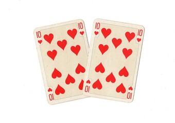 A pair of identical vintage playing cards isolated on a white background.