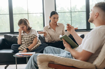 Fototapeta premium Mental breakdown, girl is crying. Mother with her daughter are at psychologist appointment
