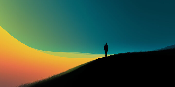 Silhouette on hill beneath colorful gradient sky