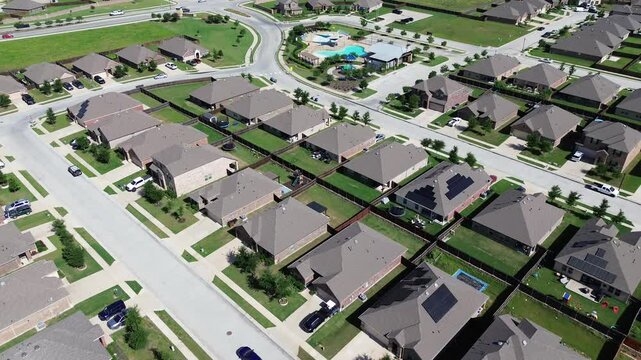 New construction homes with solar panel roof, large backyard, wooden fence in fast growing Princeton, Collin County, TX, community recreational facilities pool, shaded playground, pergola, flyover