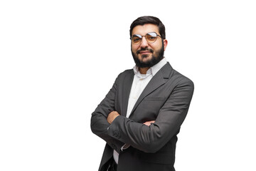 Confident businessman in stylish attire stands with arms crossed against a clean white backdrop