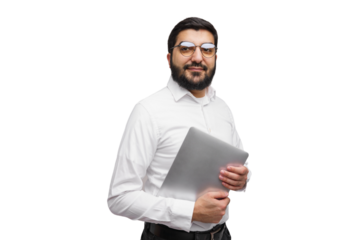 Confident man in formal attire holding a laptop during a creative business meeting indoors