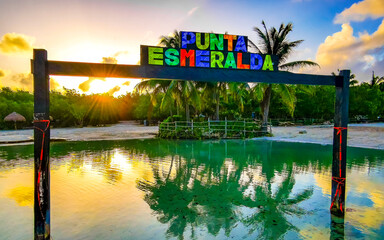 Cenote cave river colorful lettering welcome sign Punta Esmeralda Mexico.