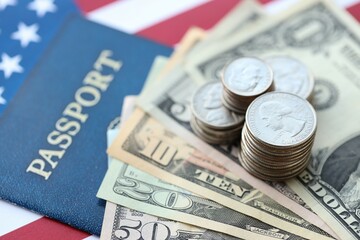 American US dollars money bills and passport with american flag