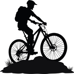 Obraz premium Black silhouette of mountain biker on top of a rock. Great for sports, nature, or exploration themes