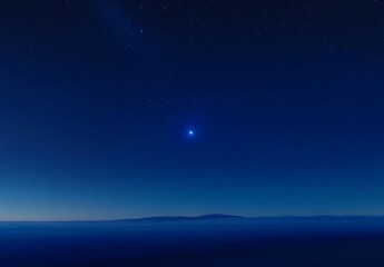 A dark advertisement background with a blue space texture and blank signature has a starry sky abstraction that evokes a glowing concept and atmosphere of awe and science with luminance and a