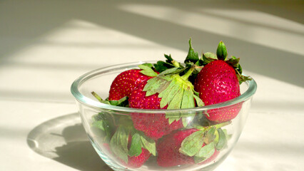Fresh and Juicy beautiful organic strawberries on wooden background. Top view point.