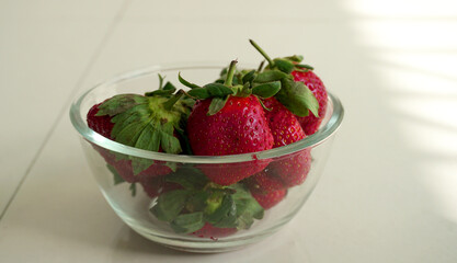 Fresh and Juicy beautiful organic strawberries on wooden background. Top view point.
