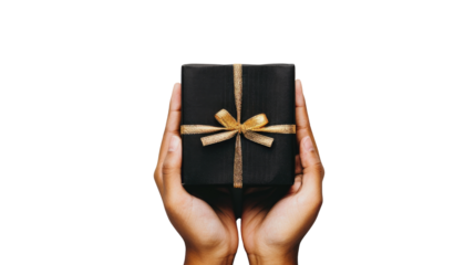 Gift box being held with care, showcasing elegant black wrapping and a luxurious gold bow, perfect for any celebration or occasion
