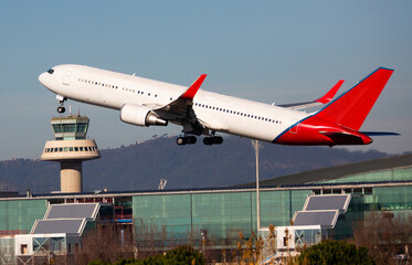 Image of passenger airplane take-off from airport at day