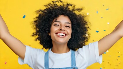 A woman is smiling and jumping in the air with confetti falling around her. Concept of joy and celebration - Powered by Adobe