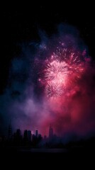 Vibrant fireworks display over a city skyline at night