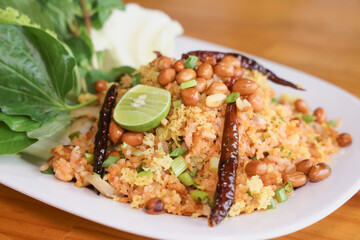 Nam Khao Tod – Thai Crispy Rice Salad with Fermented Pork and Fresh Herbs