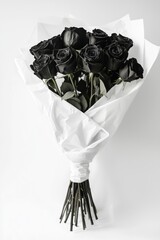Bouquet of elegant black roses wrapped in white paper – suitable for gothic weddings, alternative Valentine's Day, art photography, or modern decor