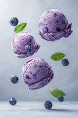Floating blueberry ice cream scoops with fresh berries and mint leaves – ideal for dessert packaging, summer advertising, or food blog visuals